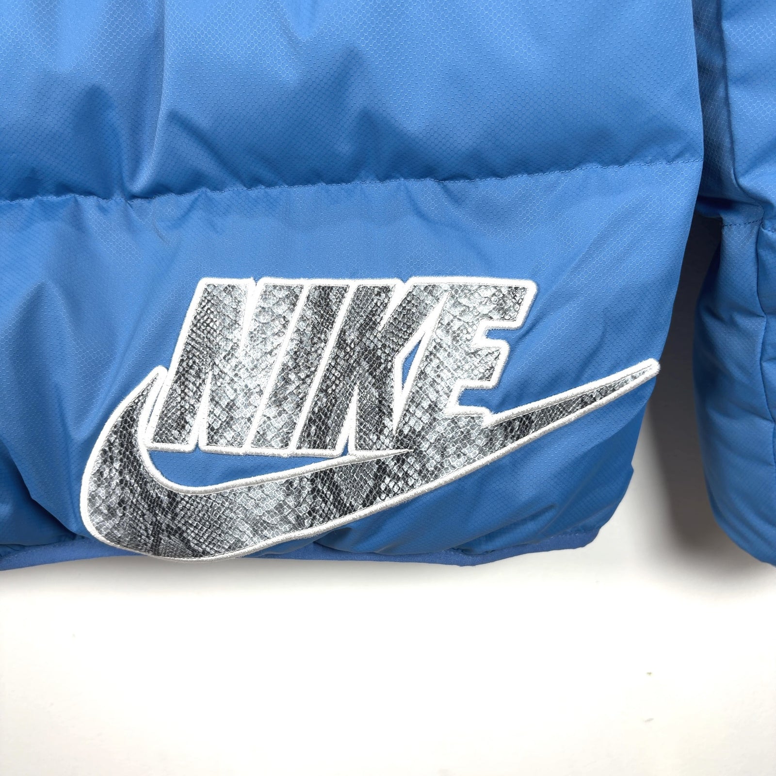 Supreme x Nike Snakeskin Patch Logo Puffer Jacket