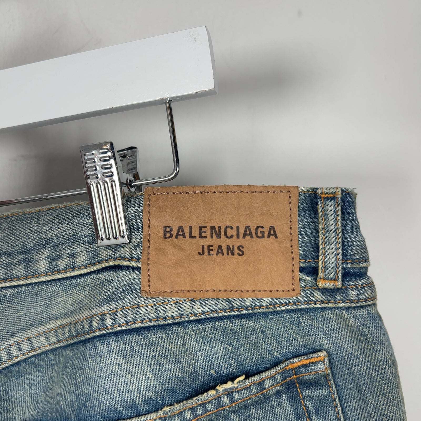 Balenciaga Waxed Distressed Denim Jeans