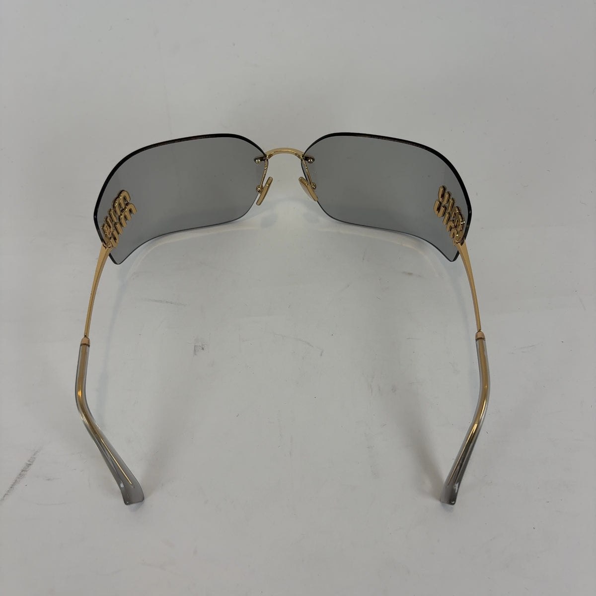 Miu Miu Wraparound Logo Sunglasses