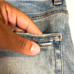 Amiri Clay Indigo Quilted Art Patch Denim Jeans
