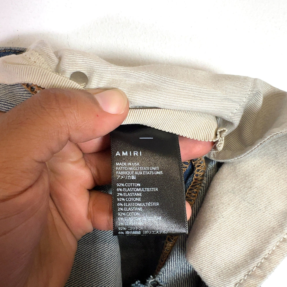 Amiri Clay Indigo Quilted Art Patch Denim Jeans