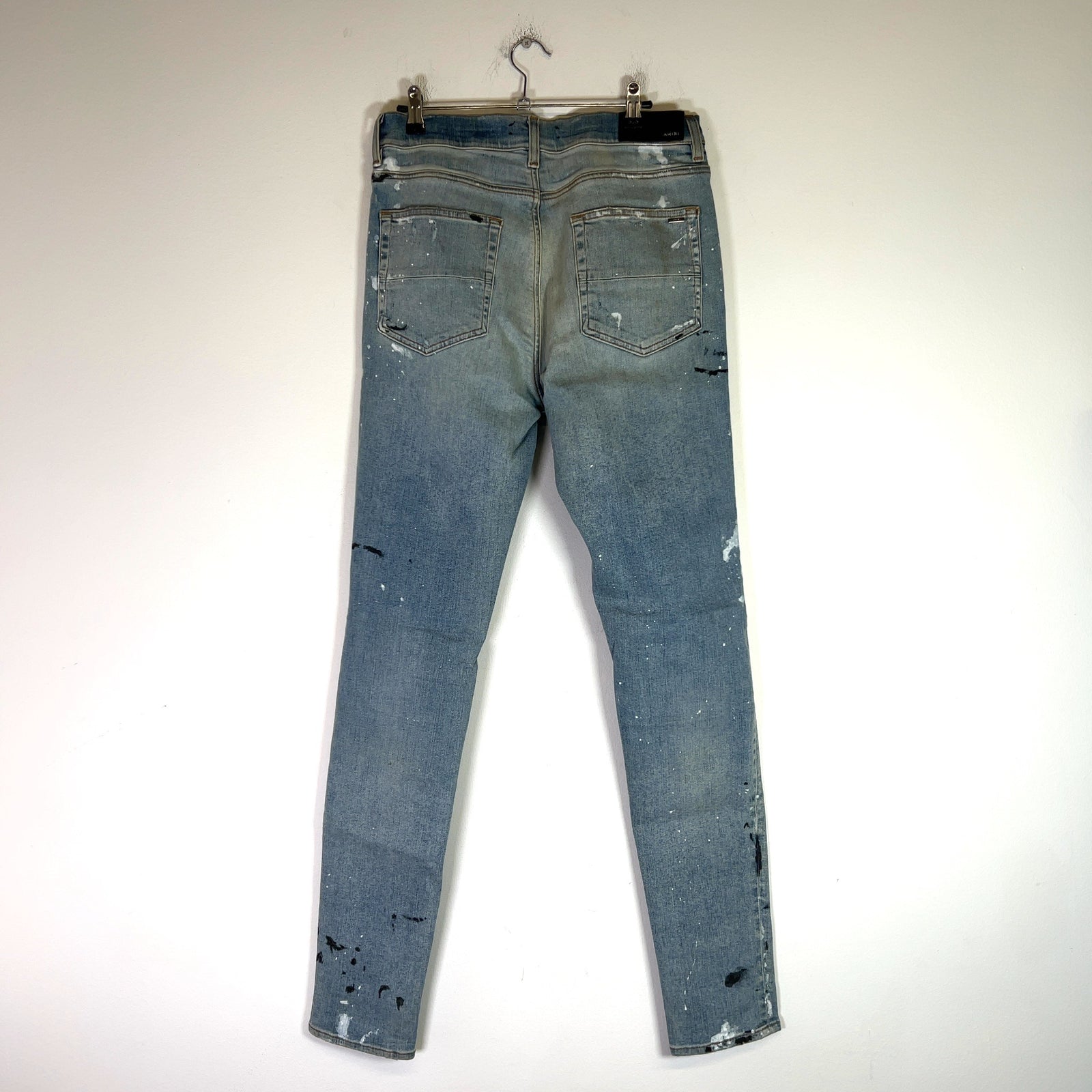 Amiri Distressed Paint Splatter Denim Jeans