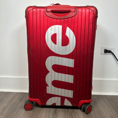 Supreme Rimowa Red Topas 82L Suitcase
