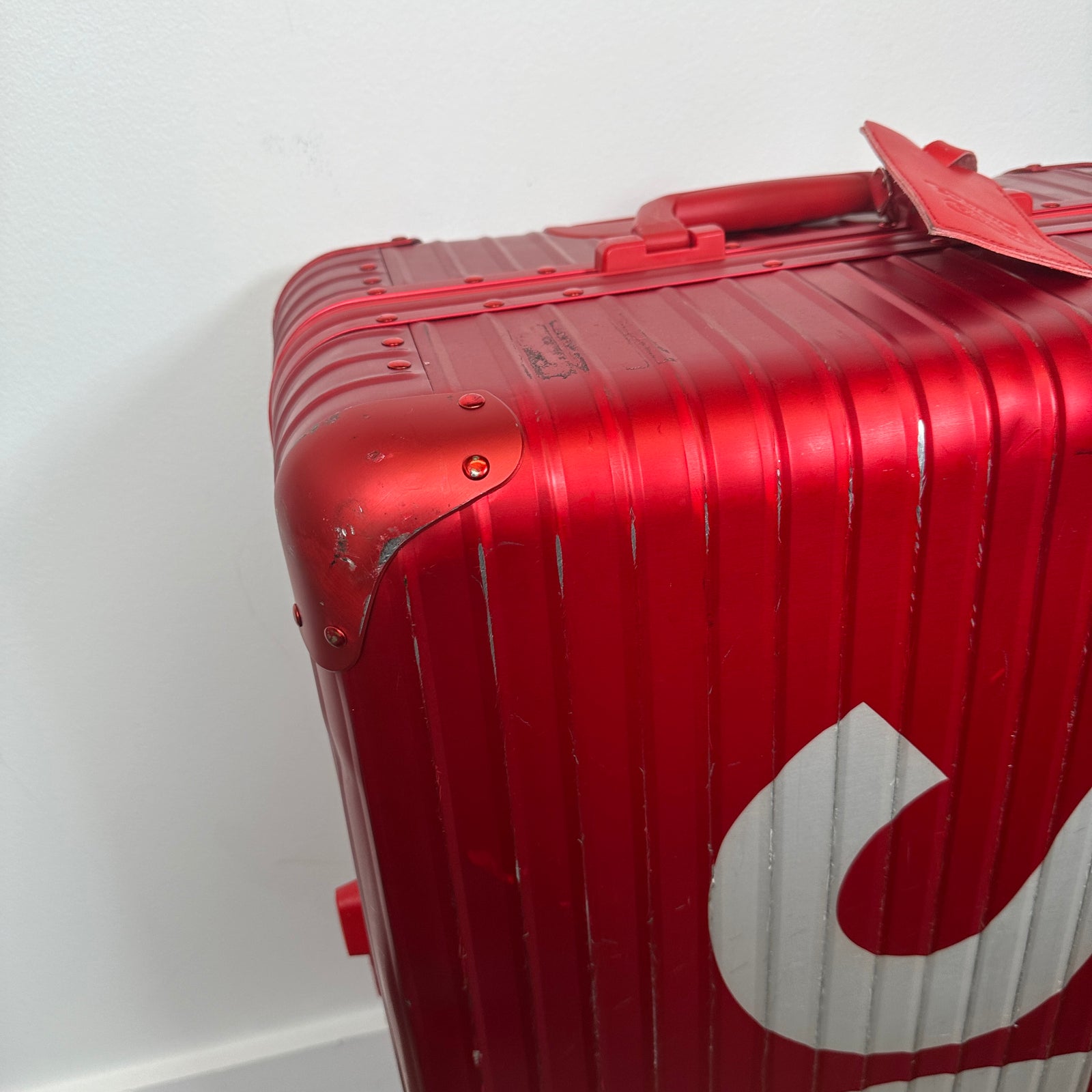 Supreme Rimowa Red Topas 82L Suitcase