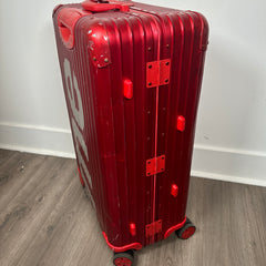 Supreme Rimowa Red Topas 82L Suitcase