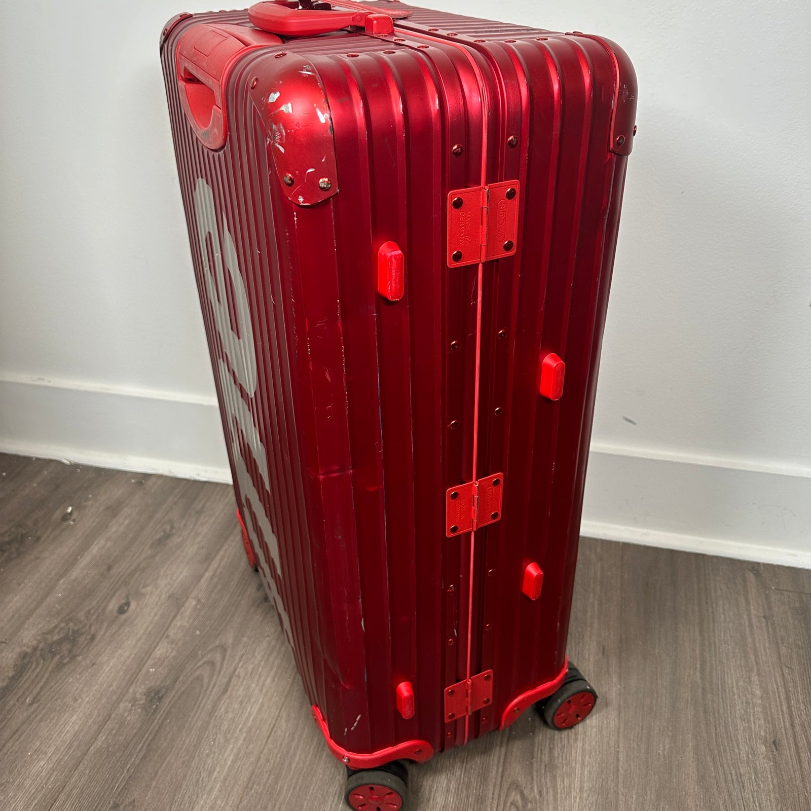 Supreme Rimowa Red Topas 82L Suitcase