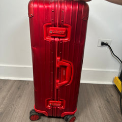 Supreme Rimowa Red Topas 82L Suitcase